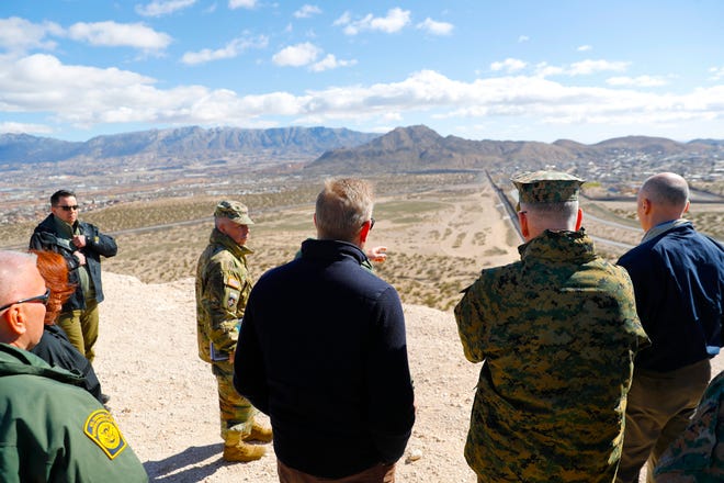 Acting Secretary of Defense Patrick Shanahan, center, and Joint Chiefs Chairman Gen. Joseph Dunford, second from the right, look across the horizon during a tour Saturday of the U.S.-Mexico border at Santa Teresa Station in Sunland Park, N.M. [Pablo Martinez Monsivais/Associated Press}