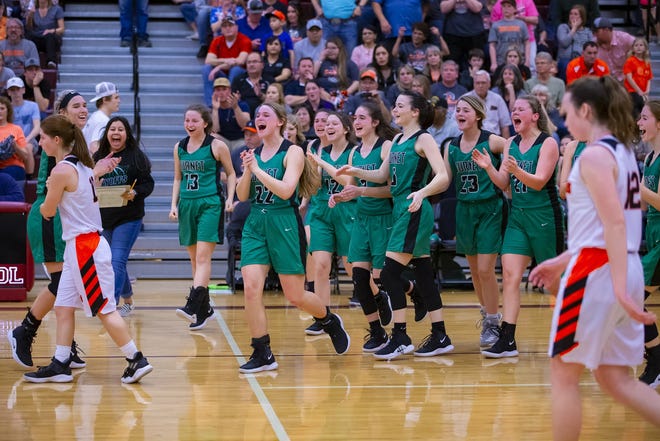 Burnet's girls basketball team, celebrating a win over Smithville earlier in the playoffs, beat rival Liberty Hill Saturday in the Class 4A Region IV championship to earn a spot in this week's state tournament in San Antonio. [JOHN GUTIERREZ / FOR AMERICAN - STATESMAN]