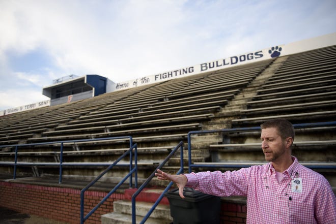 Principal Thomas Hatch discusses the history and future of the Terry Sanford High School stadium on Feb. 12. [Melissa Sue Gerrits/The Fayetteville Observer]