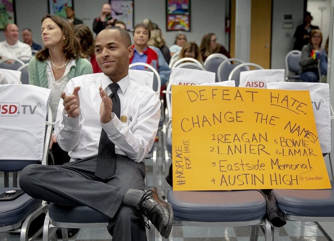 Jared Breckenridge applauds after the board voted to change the name change of Reagan High to North East High during an Austin ISD school board meeting on Monday, Feb. 25, 2019, in Austin, Texas. NICK WAGNER/AMERICAN-STATESMAN]