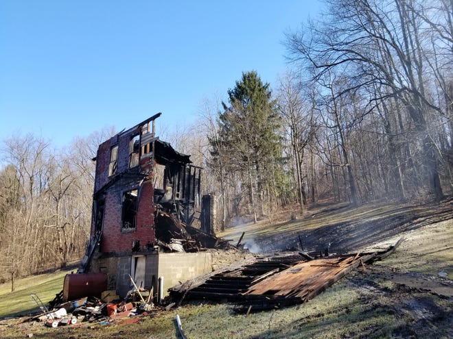 A fire destroyed a home Monday morning at 812 Monaca Road in Hopewell Township. No one was injured in the fire. [Rachel Wagoner/BCT Staff photo]