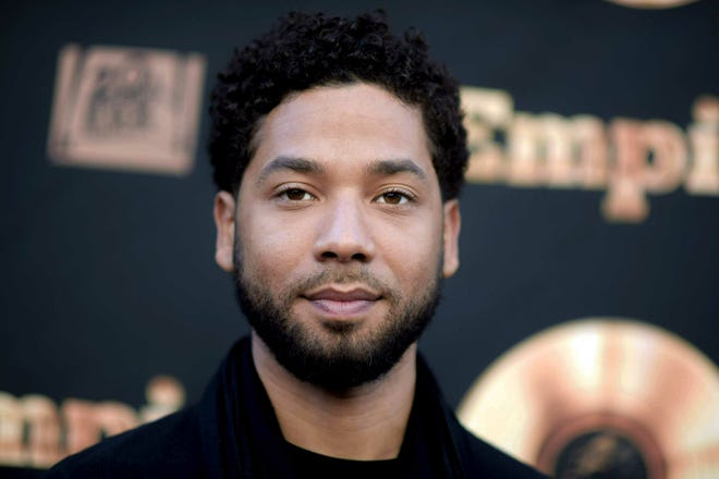 In this May 20, 2016 file photo, actor and singer Jussie Smollett attends the "Empire" FYC Event in Los Angeles. Terrence Howard, the actor who plays Jussie Smollett's father on "Empire" has expressed support for his fellow cast member on social media. Smollett, who is black and gay, is charged with filing a false police report in January 2019 when he said he was attacked in Chicago by two masked men who used derogatory language and put a rope around his neck. [Richard Shotwell/Invision/AP, File]