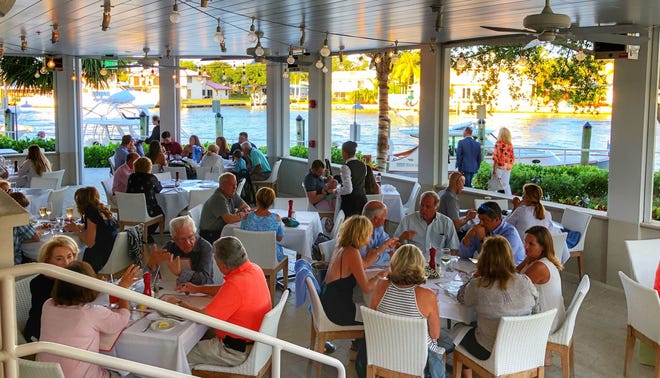 There's a new name for BrickTop's on PGA Boulevard, but the restaurant now known as the River House has the same sparkling water views. [LIZ BALMASEDA/palmbeachpost.com]