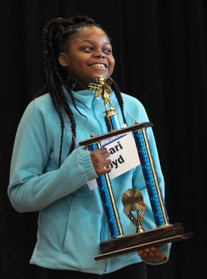 Kamari Floyd spelled her way to the national spelling bee by winning The Star Spelling Bee Tuesday. [Diane Turbyfill/The Star]