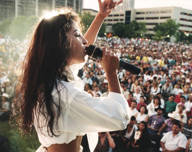 Selena performs at Hemisfair Plaza in San Antonio, TX, April 24, 1994. Photo by Sung Park / The Austin American-Statesman.