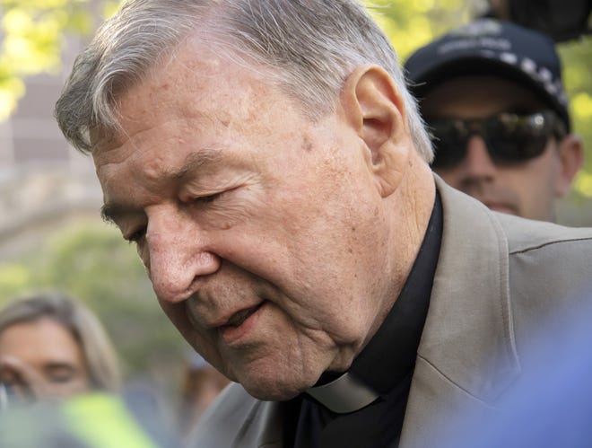 Cardinal George Pell arrives at the County Court in Melbourne, Australia, Wednesday. The most senior Catholic cleric ever convicted of child sex abuse faces his first night in custody following a sentencing hearing on Wednesday that will decide his punishment for molesting two choirboys in a Melbourne cathedral two decades ago. [Andy Brownbill/AP Photo]