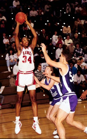 Former Southeastern Community College All-American Kevin Sams (34) shoots during a game in 1989 in West Burlington. He is now an assistant coach for the Little Priest Tribal Community College men's basketball team in Winnebago, Nebraska. [Tony Miller/thehawkeye.com]