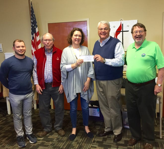 Pictured, from left are the Rev. Juston Smith; Harry Petrey, incoming president of the First United Methodist Men; Kim Wheeler, director of Crisis Assistance Ministry; Bob Lowder, who handles the finances for the men's group; and and Skip McPhail, current First United Methodist Men's president. [PROVIDED PHOTO]