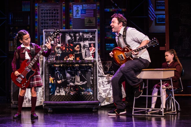 LeAnne Parks on bass channels the cool stoicism of icons of rock and rock and roll as Katie under the tutelage of Merritt David Janes as her substitute teacher in "School of Rock." [PHOTO BY EVAN ZIMMERMAN, MURPHYMADE]