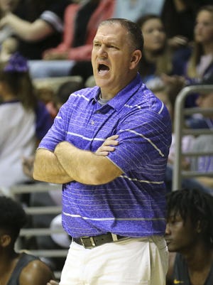 Bibb County coach Russell Wallace yells instructions to his team as they play Central during the Southwest Region final Thursday, Feb. 21, 2019, in Montgomery. [Staff Photo/Gary Cosby Jr.]