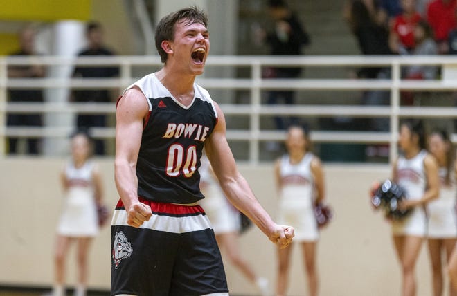 Bowie guard Riley Mcintyre celebrates the 46-29 regional quarterfinal win over Lake Travis on Tuesday. The Bulldogs will face Laredo Nixon in a regional semifinal Friday night. [STEPHEN SPILLMAN/FOR STATESMAN]