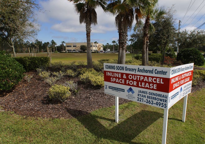 This photo shows the site of a planned grocery-anchored center on the northeast corner of LPGA and Williamson boulevards in Daytona Beach. Orlando developer Unicorp on Wednesday, Feb. 27, 2019, bought the site with plans to take over development of the project. Also pictured in the background is the Conciege office building which was not part of the land sale. [News-Journal/Nigel Cook]
