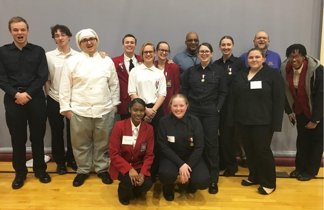 Milton Hershey School senior Davan Hanley (third from left, back row), who is from Dover, recently competed at the 2019 District SkillsUSA Competition. After competing against 22 technical schools from across Central Pennsylvania and applying his technical abilities in customer service and culinary arts, Hanley received a silver medal. SkillsUSA is a partnership of students, teachers, and industry professionals working together to ensure America has a skilled workforce. The Milton Hershey School SkillsUSA chapter is connected to the schoolís award-winning Career and Technical Education program. Hanley takes specialized culinary arts classes where he gains hands-on experience in culinary arts and additional career exposure and preparation before graduation. He plans to attend culinary school after graduating from high school in June. The school is located in Dauphin County, Pennsylvania. [Courtesy photo]