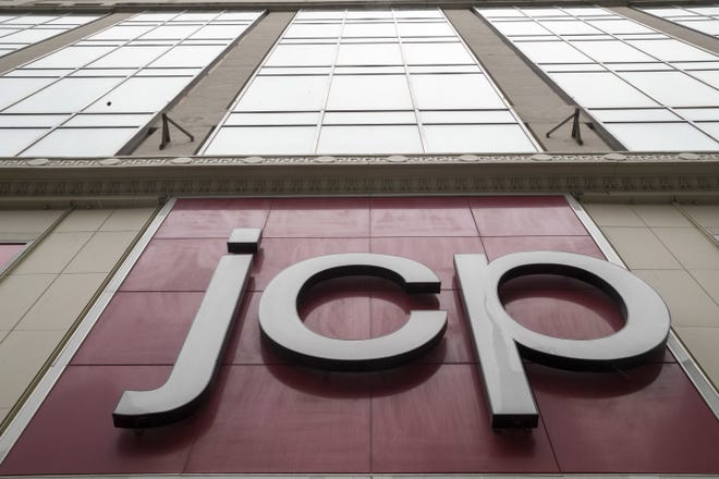 The JC Penney logo is seen hanging outside the Manhattan Mall in New York.  [AP File Photo]