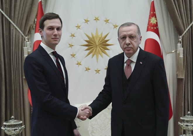 Turkey's President Recep Tayyip Erdogan, right, shakes hands with Jared Kushner, left, U.S. President Donald Trump's adviser, before their meeting at the Presidential Palace in Ankara, Turkey, on Wednesday, Feb. 27, 2019. Erdogan met with with U.S. President Donald Trump's adviser and son-in-law for talks that are expected to centre on his planned Mideast peace initiative. Turkey's Economy Minister Berat Albayrak, who is Erdogan's son-in-law, was also present. [Presidential Press Service via AP, Pool]