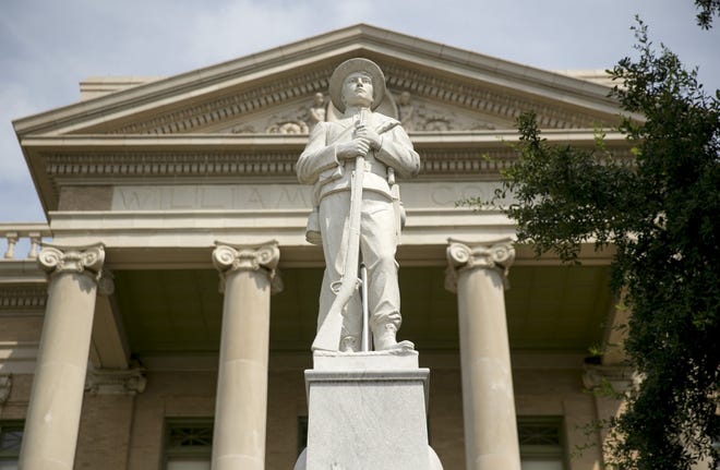 Residents have previously asked the Williamson County Commissioners Court to move the statue of a Confederate soldier from the courthouse lawn. A bill filed last week in the Texas House would require school boards, counties and municipalities to get approval from a public vote before altering or removing historical monuments or memorials. [JAY JANNER / AMERICAN-STATESMAN]