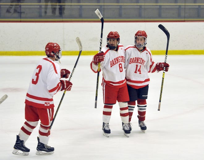 Barnstable's Jac Cordeiro (8) and Chris Cordeiro (14) celebrate a goal with teammate Dillon Huntington during a practice scrimmage Wednesday afternoon at the Hyannis Youth & Community. The Cordeiros have played well together when placed on the same line, including the power-play unit.

[Merrily Cassidy/Cape Cod Times]
