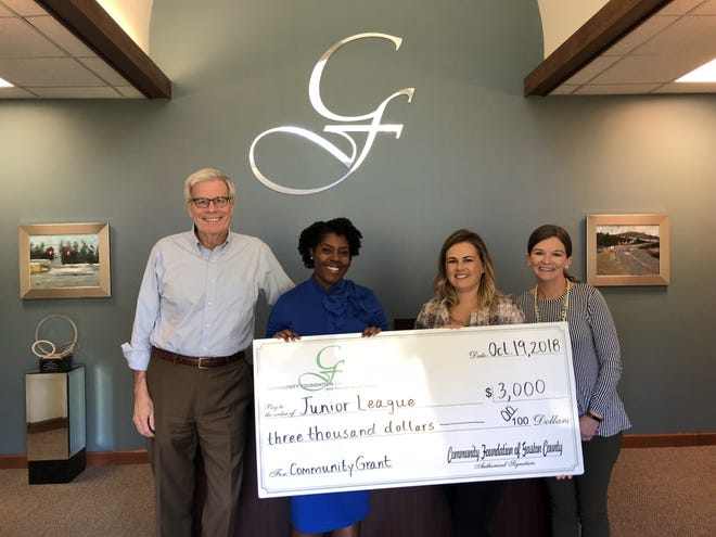 Pictured from left, Community Foundation Executive Director Ernest Sumner, Darcell Walker and Trish Goble from the Junior League of Gaston County, and Erin Wiggins, Community Foundation staff member. [PROVIDED PHOTO]