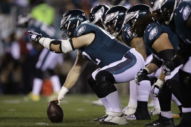 Eagles center Jason Kelce prepares to snap the ball against Washington in a December victory. [MATT ROURKE / THE ASSOCIATED PRESS]