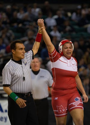Rancocas Valley's Kaila Mungo makes history by winning the state championship at 235 pounds at Boardwalk Hall on Saturday. [DAVE HERNANDEZ / PHOTOJOURNALIST]
