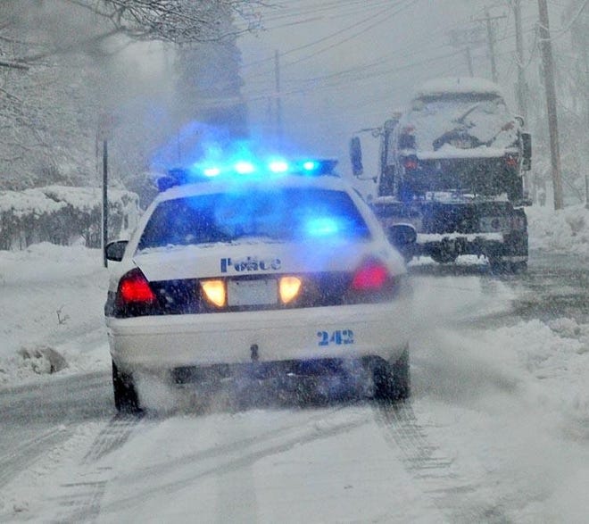 Taunton police have a car towed after its owner didn’t heed the parking ban. [Taunton Gazette File Photo by Mike Gay]