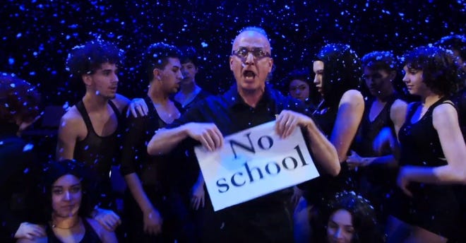 This image was taken from "#Snowday - a Musical Medley" starring Case High School Principal Brian McCann and actors and dancers from Case. [Image from YouTube]