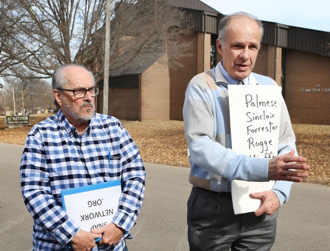 Kansas City Survivors Network of those Abused by Priests leader Jim McConnell and supporter Larry Davis demonstrate against clergy abuse at a Topeka rally last month. A woman who is now in her 30s claims she was abused by a priest when she was a minor attending Most Pure Heart of Mary School in Topeka. [February 2019 file photo/The Capital-Journal]