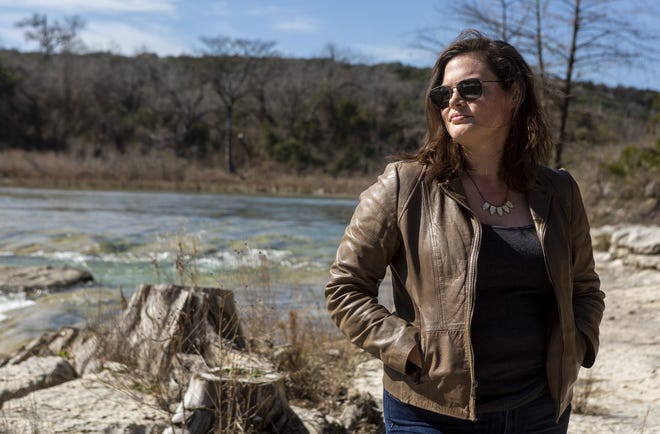Lucy Johnson looks out over the Blanco River that runs through the Halifax Ranch, her family property, outside Kyle, on Jan. 28, 2019. The Johnson family has owned the land since 1933 and now a pipeline is planned to be built through portions of the property. [Stephen Spillman /for Statesman]
