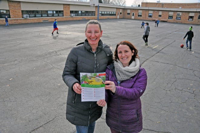 Parkview PTO president Christi Shindollar and playground project chairperson Angie Bos show a drawing of proposed courtyard and overall playground renovations for which fundraising is under way.