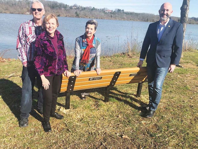 NEW BENCHES — Celebrating the installation of the plaques on the waterfront benches are Oak Ridge Rotarians Charlie Jernigan, from left, Emily Jernigan, Pat Postma, and Jim Dodson.