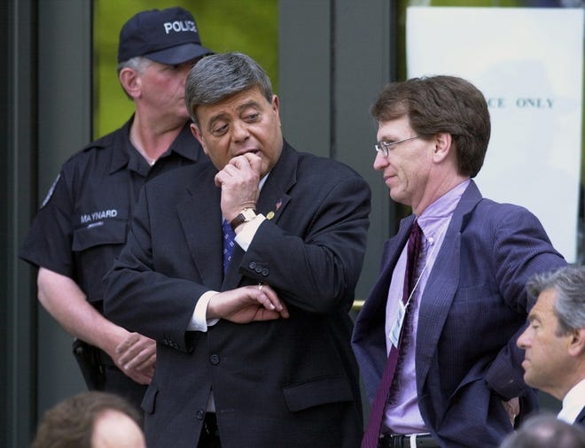 Providence Mayor Vincent A. Cianci Jr., left, talks with then-Journal reporter Mike Stanton on the steps of the federal courthouse at Kennedy Plaza during the Operation Plunder Dome trial in which Cianci was a codefendant. [The Providence Journal, file / Mary Murphy]