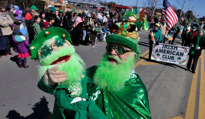 In this 2014 file photo, Dennis O'Mann and his friend Little Blarney entertain the crowd at the annual St. Patrick's Parade in South Yarmouth.