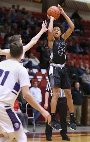 Perry´s Quentin Toles takes a shot during the third quarter of their DI district game against Jackson at the Civic Center in Canton on Wednesday, March 6, 2019. (CantonRep.com / Scott Heckel)