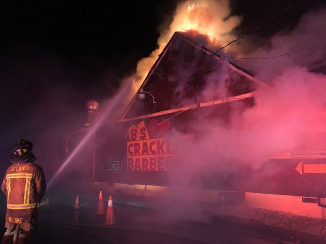 Crews battle an early morning fire at B's Cracklin' Barbecue in Atlanta. The restaurant is owned by former Savannah chef and pitmaster Bryan Furman. It's the second time Furman has lost a location to fire; the original Savannah location burned in 2015 and was later rebuilt. [Photo courtesy of Atlanta Fire Rescue Department]