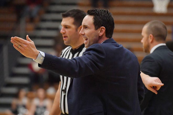 Coach Brett Ballard and the Washburn men's basketball team head into Thursday's MIAA Tournament opener at 2:15 p.m. against Southwest Baptist with substantially less pressure than their last appearance in 2018 at Municipal Auditorium in Kansas City, Mo. [January 2019 file photograph/The Associated Press]