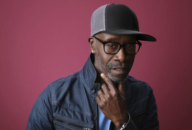 (File) Don Cheadle is one of dozens who contributed to a new report on entertainment and social change. [CHRIS PIZZELLO / INVISION]