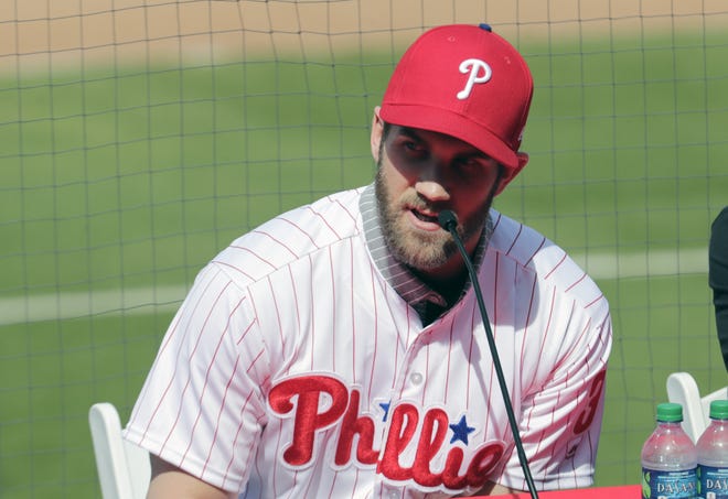 Bryce Harper speaks during a news conference at the Philadelphia Phillies spring training baseball facility in Clearwater on Saturday. Even before Harper signed with the Phillies, the National League East was loaded. [AP Photo/Lynne Sladky, File]