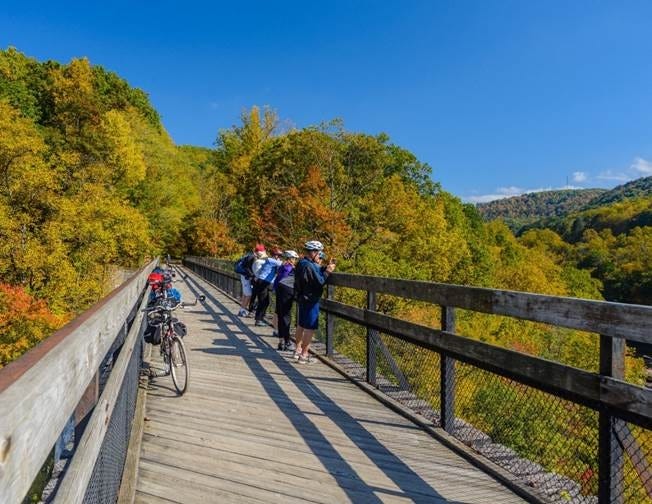 The Ohiopyle High Bridge along the Great Allegheny Passage offers a scenic view in the 335-mile bike trail explored in a new WQED-TV documentary. [Paul G. Wiegman Photos]