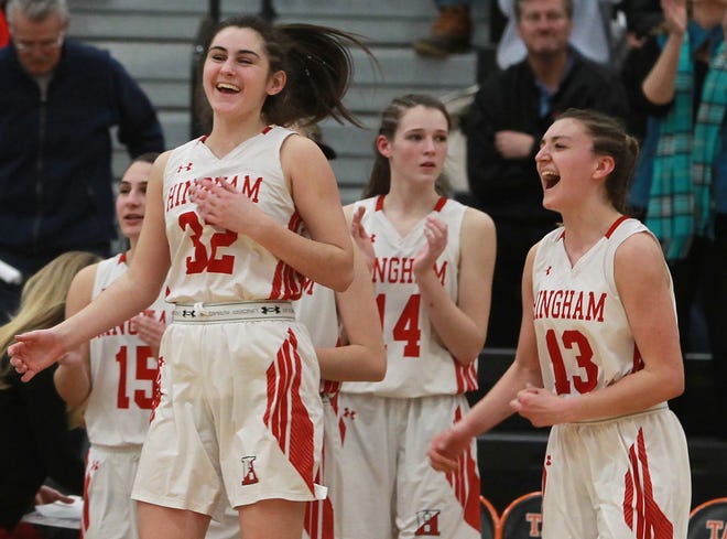 Hingham's Jess Johnson and Ryley Blasetti is all smiles after beating Old Rochester Regional 52-36 in the Division 2 south semifinal at Taunton High on Thursday, March 7, 2019. [Wicked Local Staff Photo/ Robin Chan]