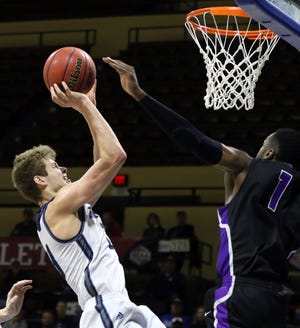 Washburn sophomore forward Will McKee, left, scored a team-high 14 points in the No. 2-seeded Ichabods' 77-58 victory over Southwest Baptist at the MIAA Tournament on Thursday at Municipal Auditorium in Kansas City, Mo. [WASHBURN ATHLETICS]