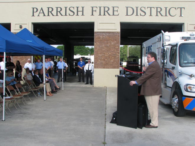 Manatee County Public Safety officials announce the addition of a county ambulance crew to work out of the Parrish Fire District station on U.S. 301 during a May 2016 ceremony. The fire district will conduct a referendum Tuesday asking for a property tax increase so it can build another station, replace equipment and hire more firefighters for the rapidly growing area. [HERALD-TRIBUNE STAFF PHOTO / DALE WHITE]