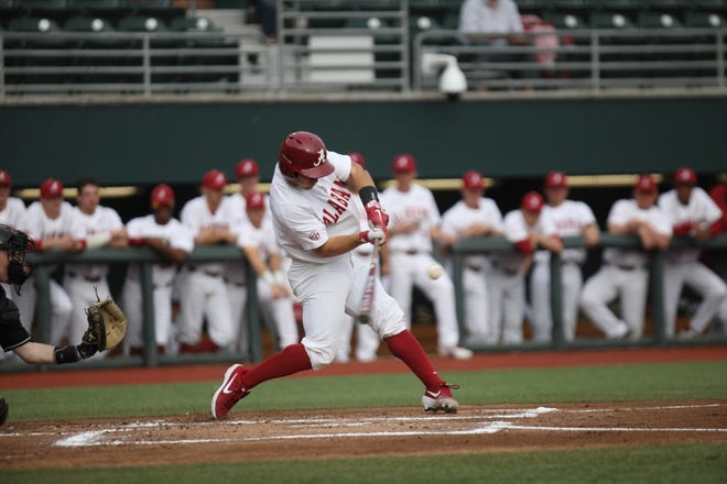Alabama's Brett Auerbach connects with a pitch and sends it flying through a gap. Auerbach went 5-for-5 in the Crimson Tide's 15-1 win against Northern Kentucky at Sewell-Thomas Stadium on Friday. [Photo/Joe Will Field]