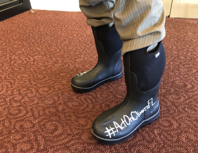 State Sen. Jose Javier Rodriguez, D-Miami, is wearing rain boots throughout Florida's 60-day legislative session to draw attention to climate change. Those concerned about the issue hope to see new opportunities to address the problem with a new governor and new crop of lawmakers pushing for action. [GateHouse Media/Zac Anderson]