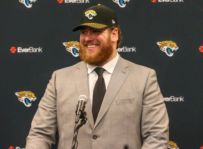 Jaguars left guard Andrew Norwell signed a five-year, $66.5 million contract in March 2018. Because Florida has no state income tax, more money will end up in Norwell's bank account than if he had signed with the New York Giants. [Gary Lloyd McCullough/For the Florida Times-Union]