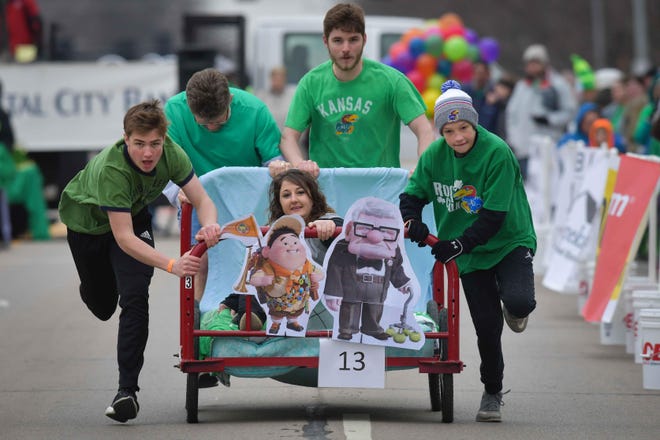 HCCI's annual Great Topeka Bed Race will begin at 10 a.m. Saturday, March 16, followed by the St. Patrick's Day Parade at noon. [March 2018 file photo/The Capital-Journal]