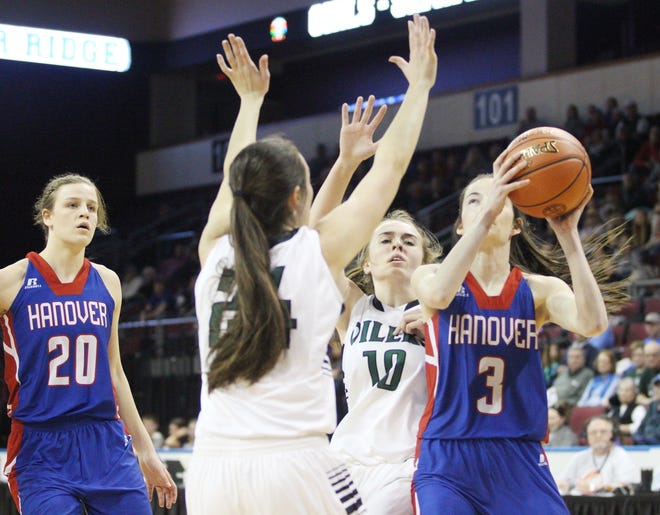 Hanover junior Cadlee Stallbaumer, right, takes aim on a contested shot Saturday during the Class 1A state championship game against the Central Plains Oilers. [Shelton Burch/GateHouse Kansas]