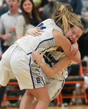 Braintree's Rebecca Horger is tackled by Kate Silvia while they celebrate their 50-34 win over Needham in the Division 1 South final at Taunton High on Friday, March 8, 2019. [Wicked Local Staff Photo/ Robin Chan]