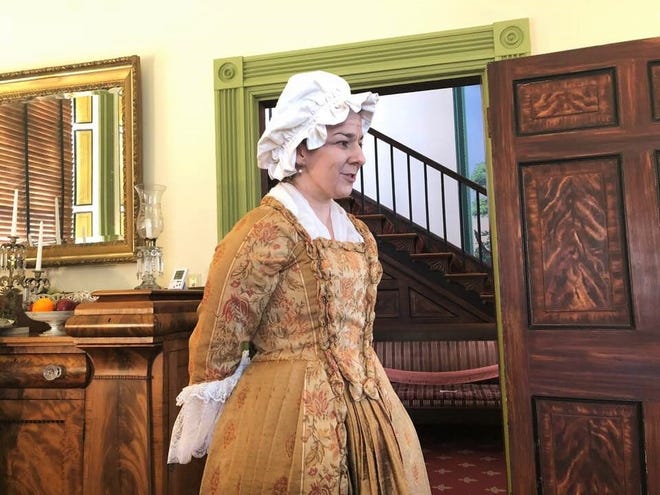 On Wednesday, March 6, living history interpreter, Debbie Phillips from Chester, portrayed the country's first lady Martha Washington in honor of National Women's History Month at the Magnolia Grange House Museum in Chesterfield. Specialty teas, finger sandwiches and sweets were served at the sold-out tea. [Kristi K. Higgins/progress-index.com]