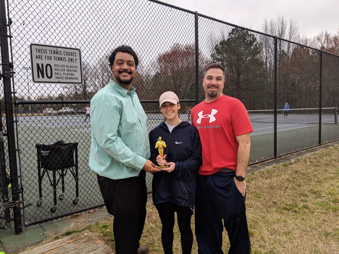 Progress-Index Sports Editor Blair Young presents the 2018 Best Player in the Region award to Dinwiddie alumna Haley Williams and coach Archie Totorice.