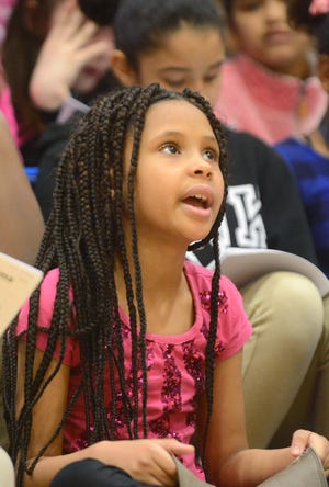 Mahan Elementary School fourth-grader Tiana Crowe sings during a rehearsal for this year's annual All City Music Festival at the Jacqueline Owens auditorium at Kelly Steam Middle School in Norwich. 

[Aaron Flaum/NorwichBulletin.com]